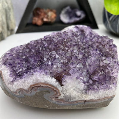 Amethyst Crystal Purple Druzy Heart close up view of cluster and thickness