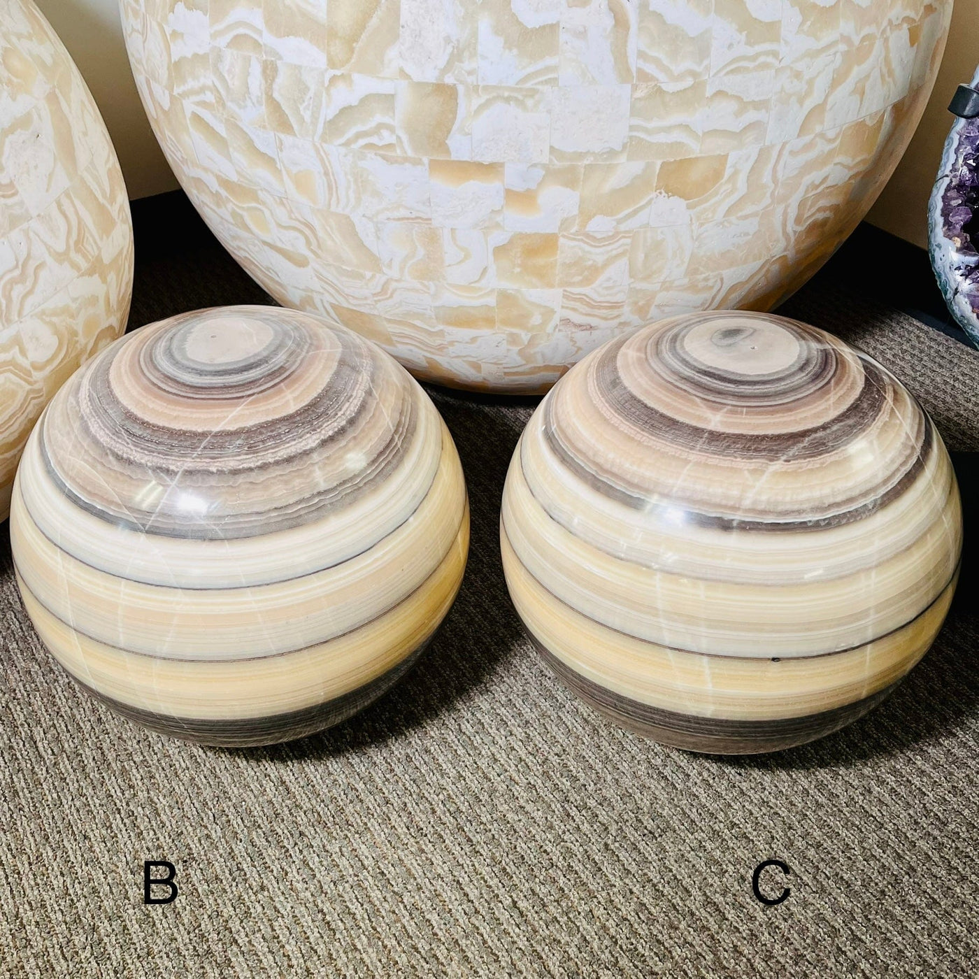 Mexican Onyx - Colossal Polished Sphere Options B and C pictured next to each other..