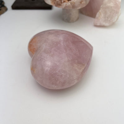 Polished Rose Quartz Heart - side view thickness reference 