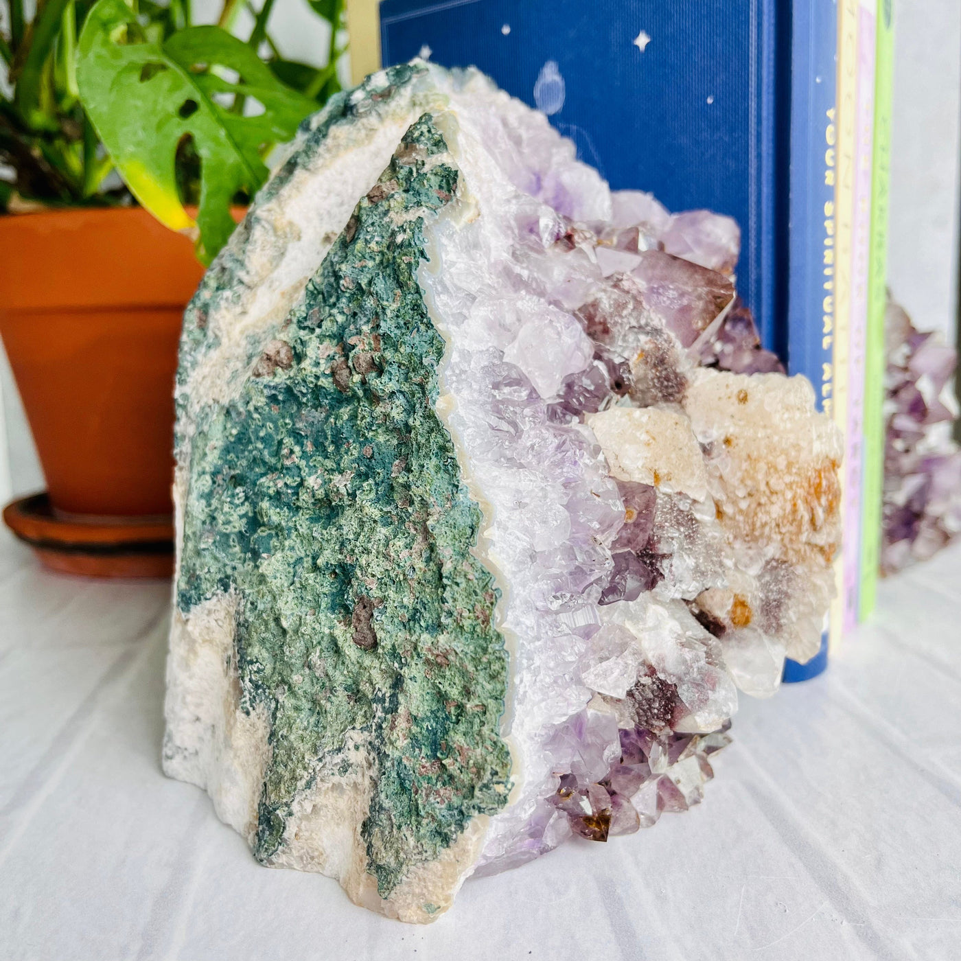 Up close view of side of left Amethyst Bookend with Calcite Cluster