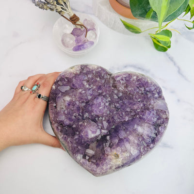 Amethyst Crystal Druzy Heart Top View With Hand For Size Reference