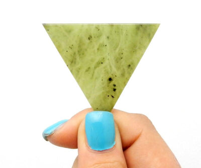 Products Nephrate Jade Triangle - held in a hand