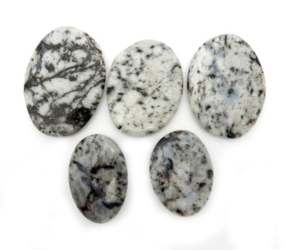 5 jasper worry stones on white background
