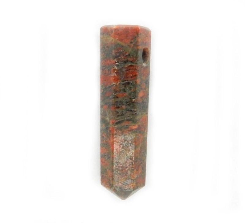up close shot of Jasper  Pencil Point Bead on white background
