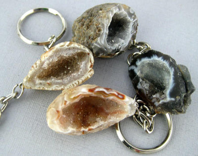 Four Agate Geode Keychain on a light colored background.