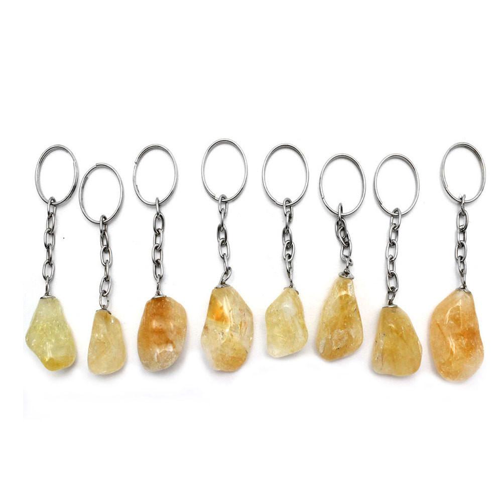 Tumbled Golden Amethyst Keychain with silver links and loop ring shown on white background for various sizes and characteristics