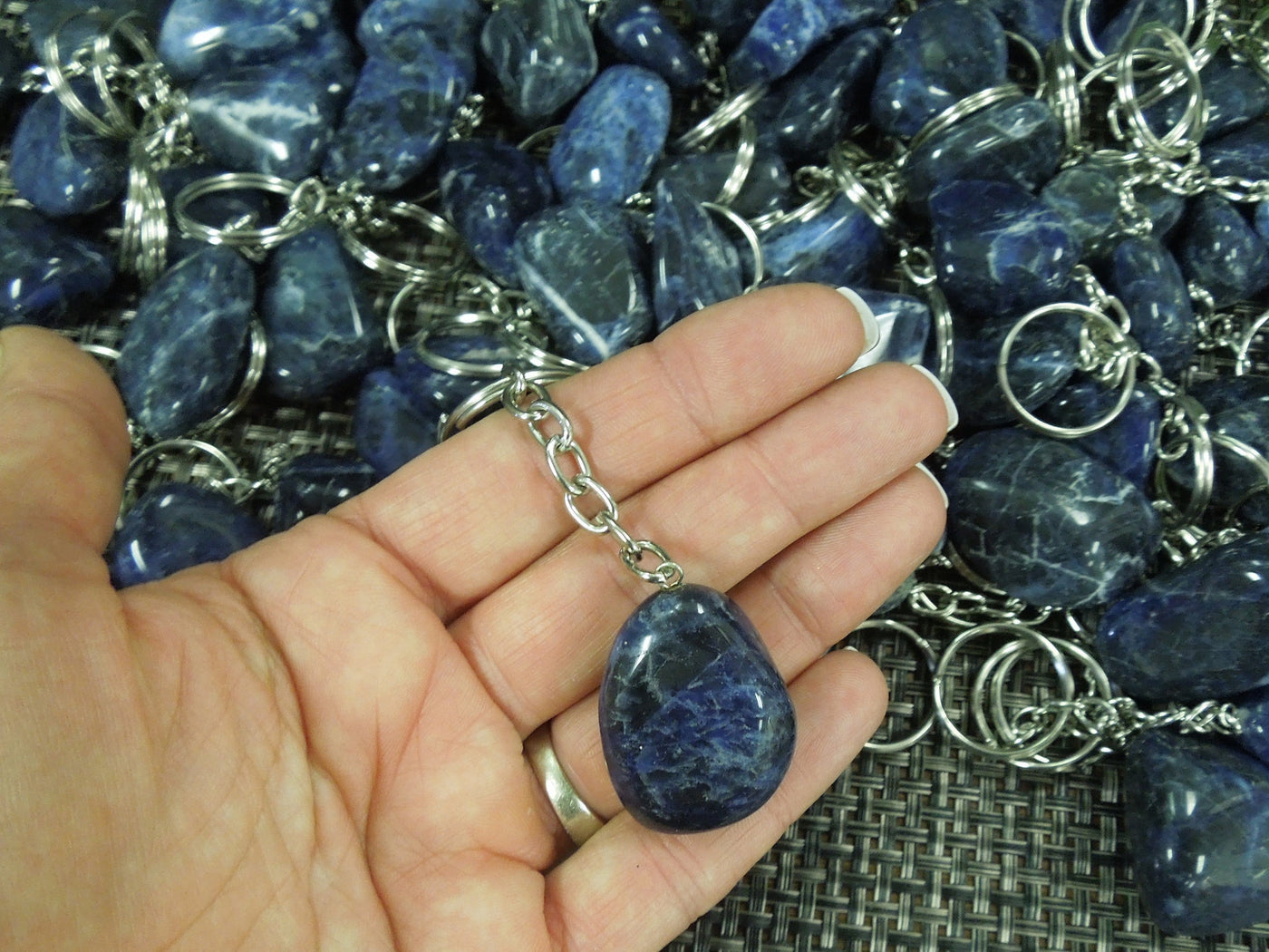 Tumbled Sodalite Silver Toned Key Chain - one in a hand