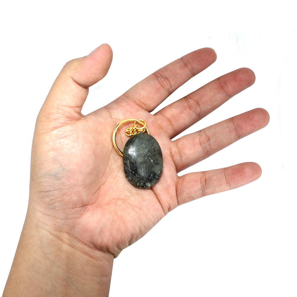 Labradorite - Labradorite Worry Stone Keychain - Gold Tone Keychain - Natural Labradorite Stone Keychain - in a hand