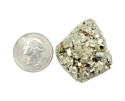 A Top view of 6 Pyrite Mixed Shape Cabochon next to a quarter for sizing 
