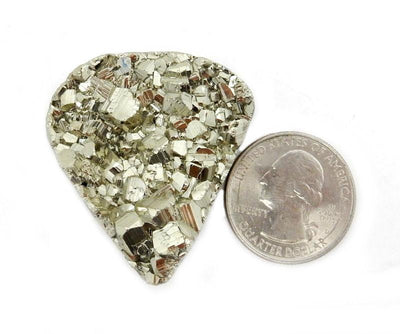 1 Large Pyrite Triangle Cabochon next to quarter for sizing 