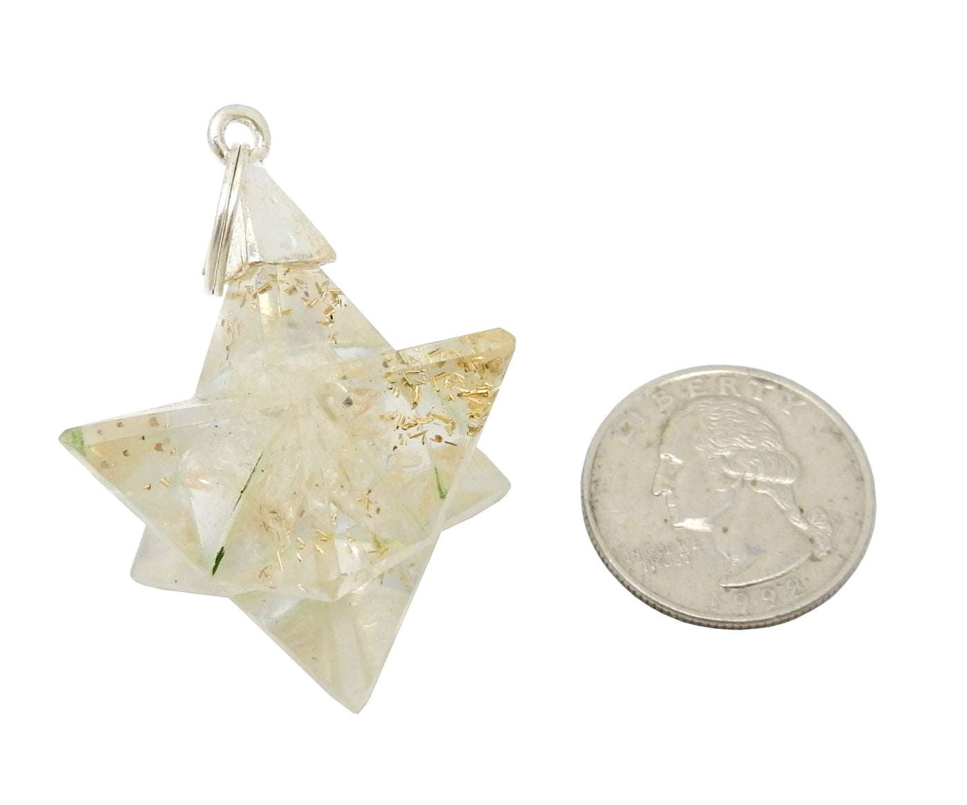Merkaba - Merkaba Star Orgone Silver Toned Bail Pendant - close up of white one next to a quarter