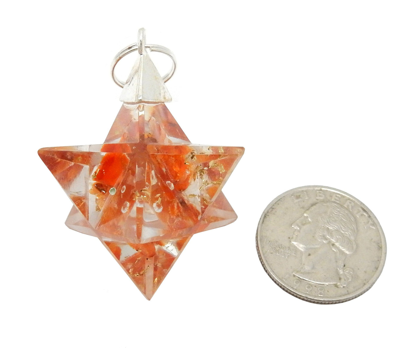 Merkaba - Merkaba Star Orgone Silver Toned Bail Pendant - orange one next to a quarter