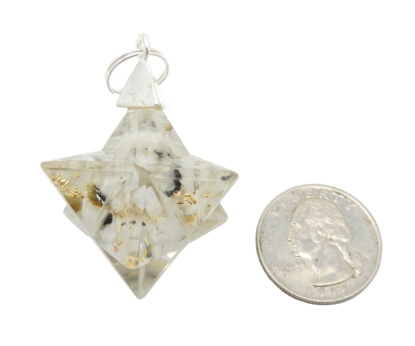 Merkaba - Merkaba Star Orgone Silver Toned Bail Pendant - white one close up next to a quarter