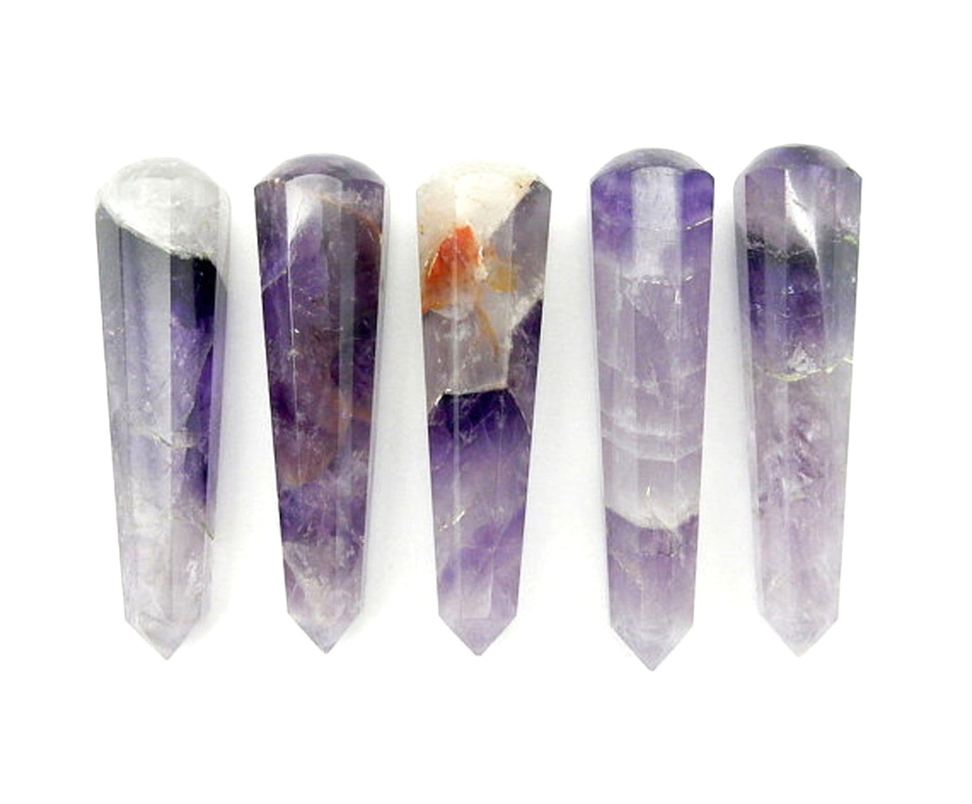 5 amethyst massage wands lined up on white background