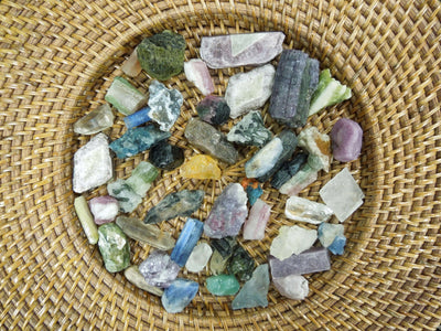 Assorted minerals in a basket.