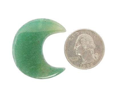 Green Aventurine Half Crescent Moon - Drilled, displayed next to a quarter for size reference.