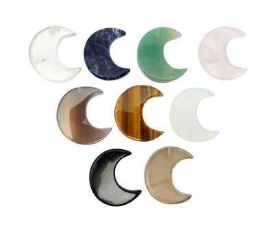 9 different available stones of the Half Crescent Moons - Drilled, displayed on a white surface.