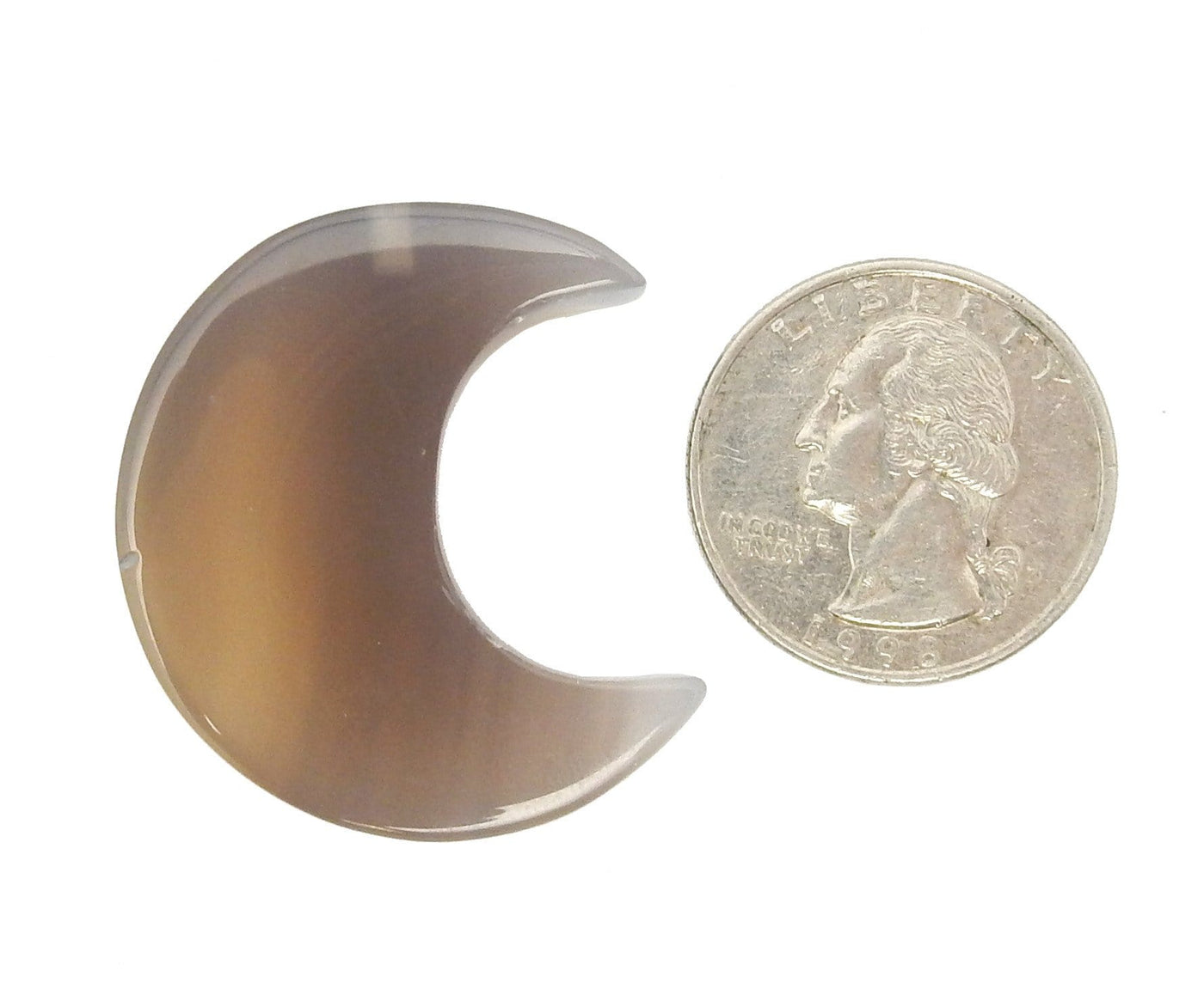 Chalcedony Half Crescent Moon - Drilled displayed next to a quarter for size reference.