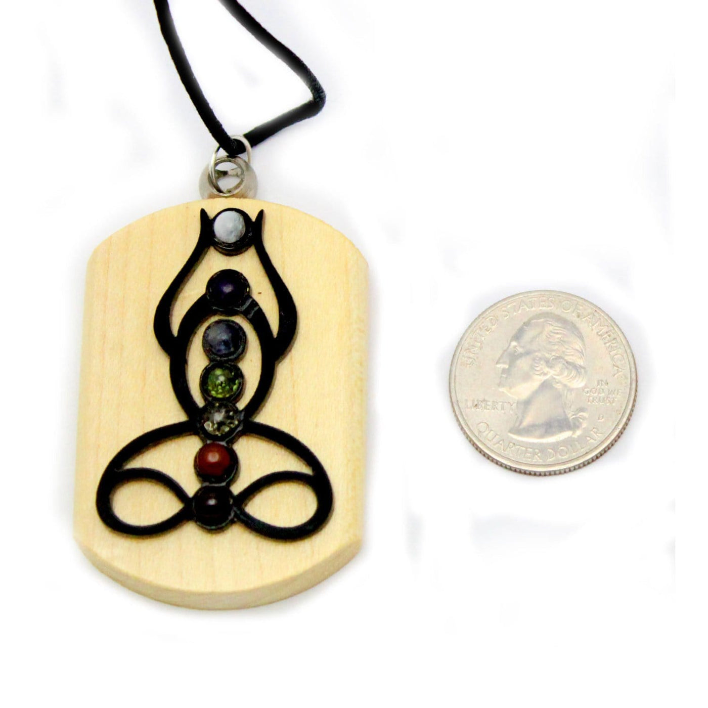 seven chakra buddha pendant with quarter for size reference