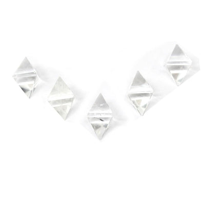 various Crystal Quartz Diamond Shaped Stone Points displayed to show various characteristics