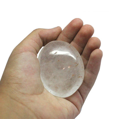 Crystal Quartz Polished Stone in a hand