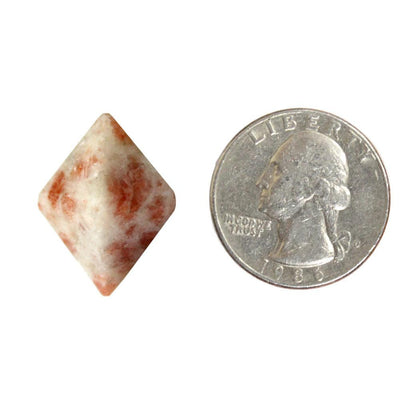 ONE (1) Sunstone Diamond Shaped Stone Point - next to a quarter