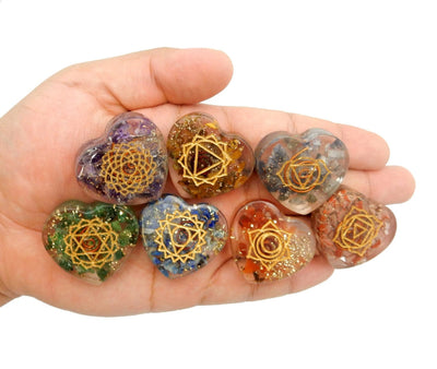 orgone chakra hearts in a hand