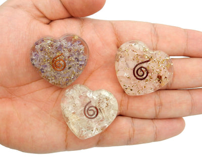 Orgone Hearts in hand for size reference