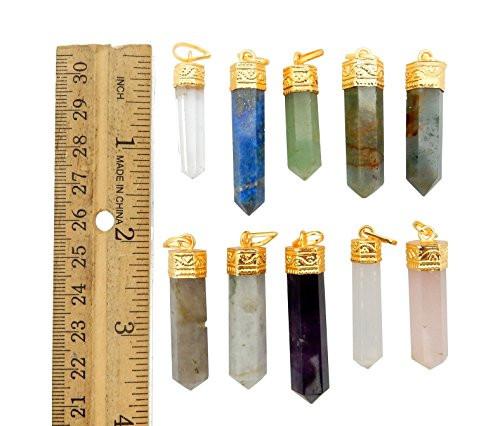 stone pencil point pendants - next to a ruler