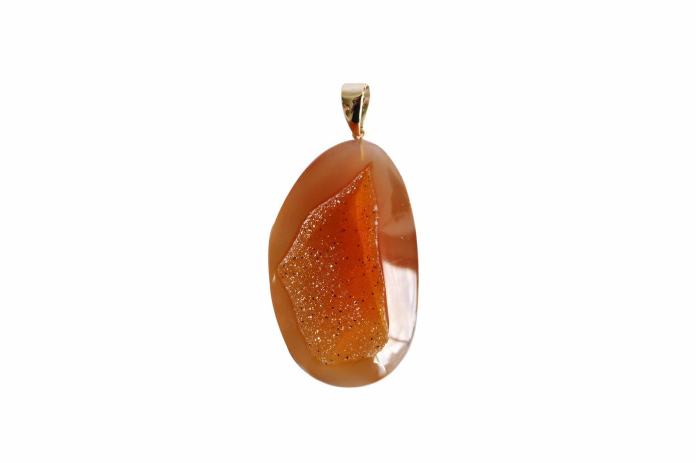 single amber natural druzy cabochon being displayed on a white background.