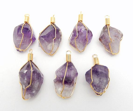 pendants available in amethyst wire wrapped in gold 