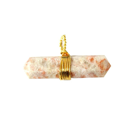 up close of the Gold Tone Wire Wrapped Sunstone Double Point Pendant for detail reference