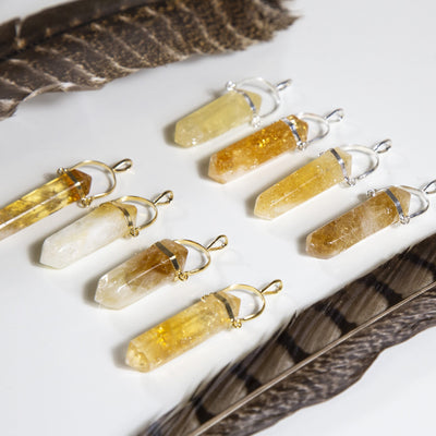 Four Citrine Pencil Point Pendant with Platinum bail and four Citrine Pencil Point Pendant with Gold bail side view