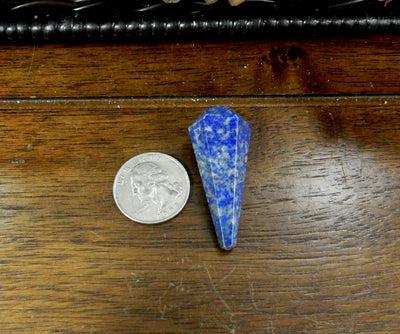 Lapis Lazuli Pendulum Point Top Side Drilled Bead next to quarter for size comparison 