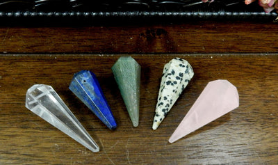 Stone pendulum points in Crystal Quartz, Lapis Lazuli , Green Aventurine, Dalmatian Jasper, and Rose Quartz