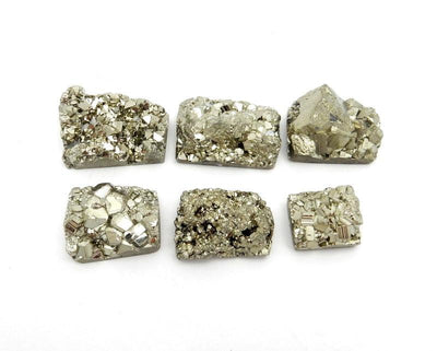 SIx Petite Pyrite Rectangle Cabochon in white background top view
