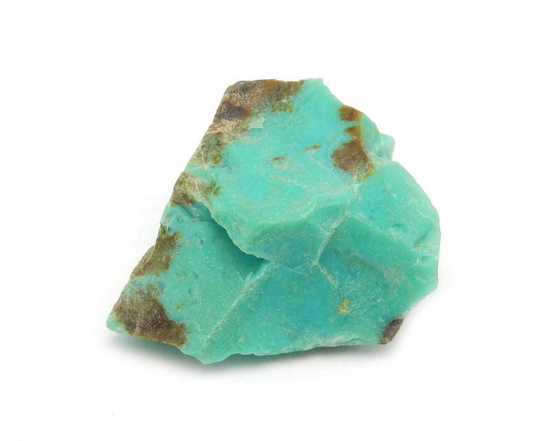 Single Petite Rough Natural Apache Turquoise in a white background close up front view