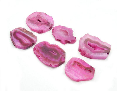 Pink Drilled Agate Slice--Side view of side by side shape with different patterns and width. 