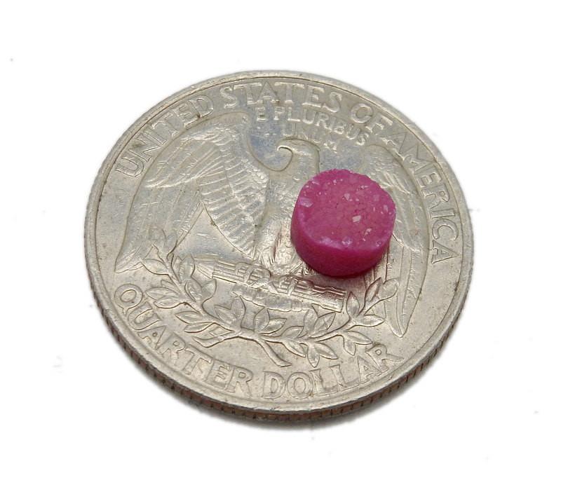 round pink druzy on a quarter
