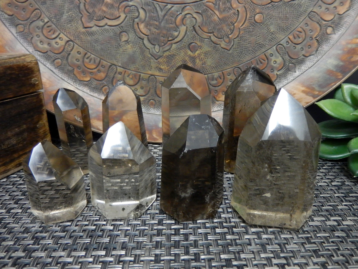 8 Smoky Quartz polished points displayed showing possible variations