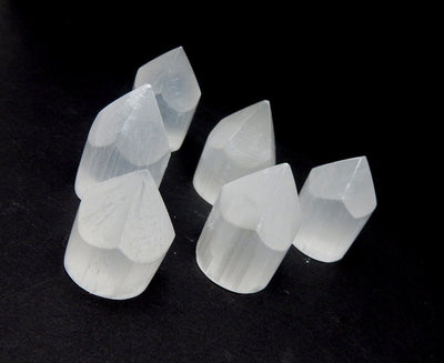 selenite points on display