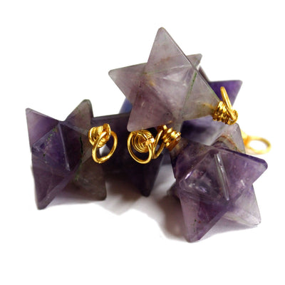 Purple Amethyst Merkaba Star Pendant   - in a pile