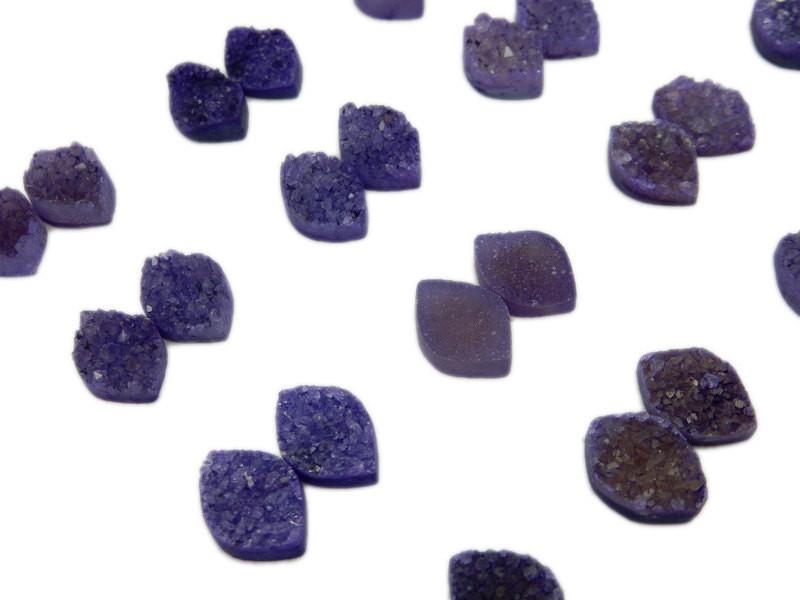 9 purple marquise druzy pairs on white background