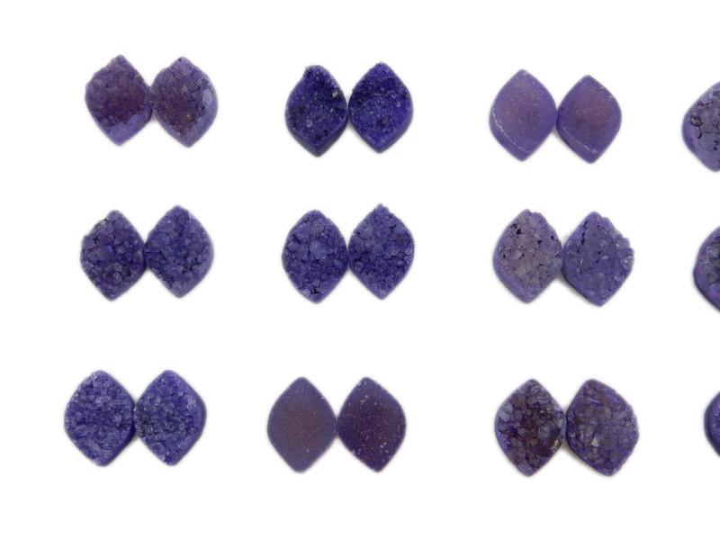 9 purple marquise druzy pairs on white background