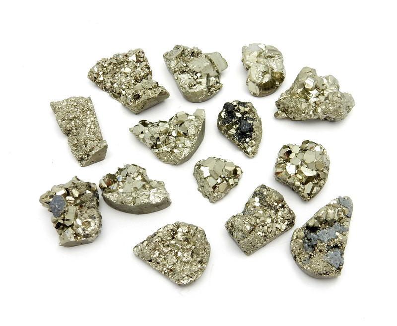 A top view of 14 Pyrite Mixed Shape Cabochons
