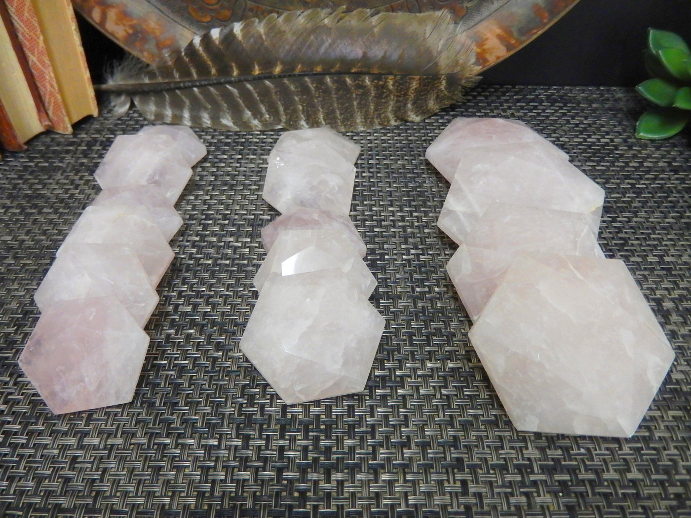multiple rose quartz shapes to show the differences in the color shades 