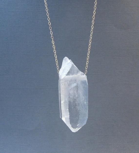 Top Side Drilled Crystal Point Bead With Necklace on White Background.