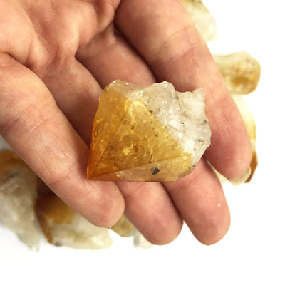 Raw Points - citrine point in a hand
