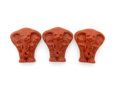 3 Red Jasper Elephant Cabochons in a line on white background