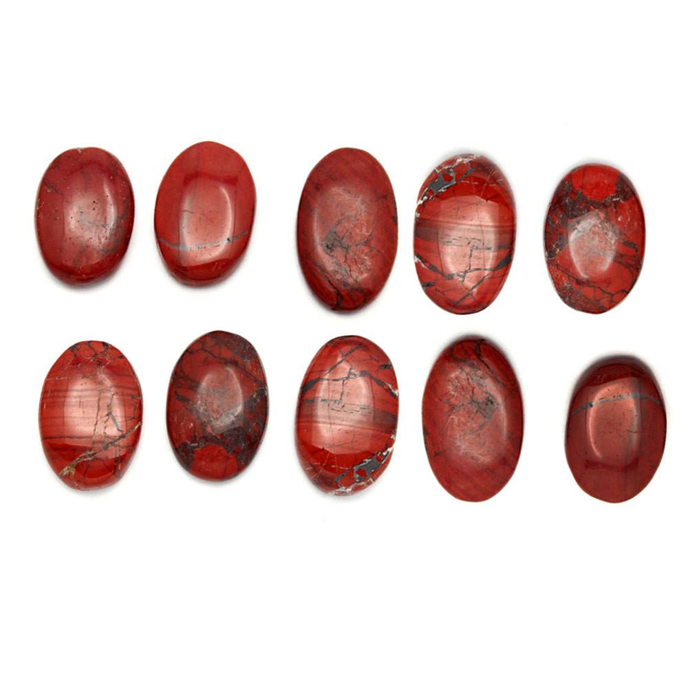 10 Red Jasper Worry Stone Slabs lined up on white background